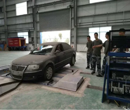 Military personnel inspecting a vehicle on the field inspection line.